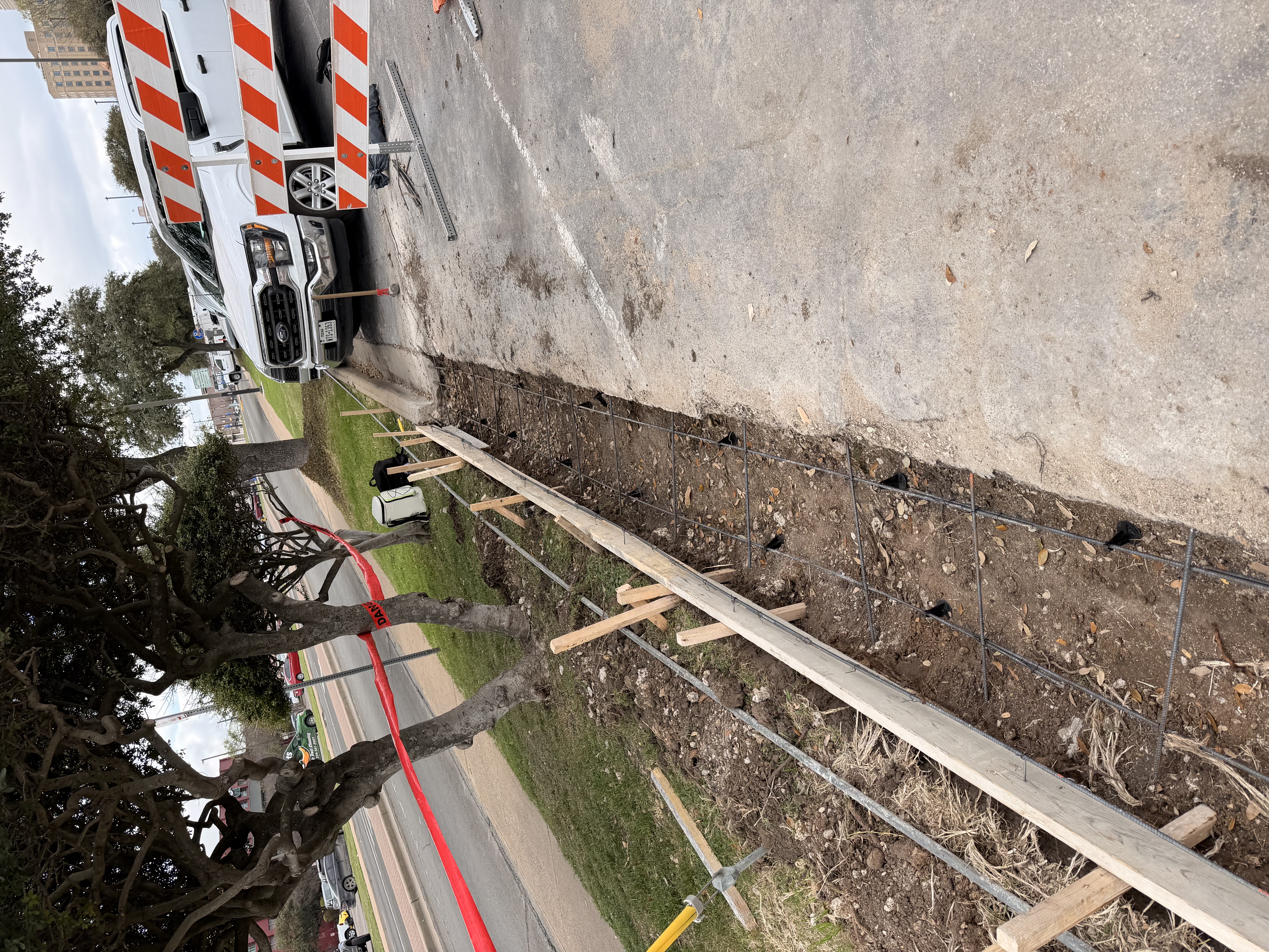 Concrete curb and gutter repair completed by APC in Central Texas